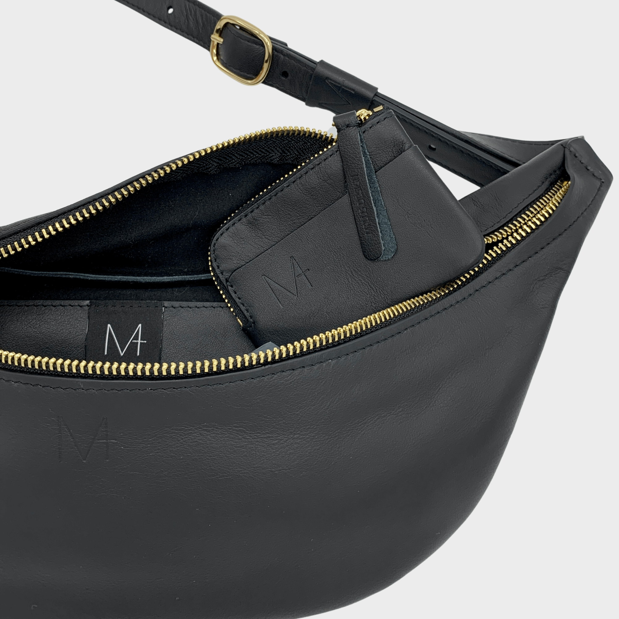 hip bag leder unisex - umhängetasche, hip bag damen leder, hip bag herren leder, minimalistisches design, nachhaltige ledertasche, bauchtasche damen leder elegant, bauchtasche damen leder schwarz, gürteltasche damen leder, gürteltasche Herren leder